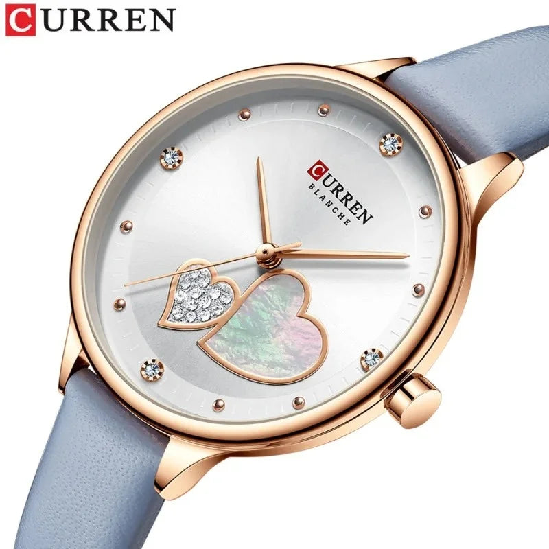 Reloj Curren 9077 de mujer, blanco con correa celeste — Foucault Valdivia
